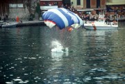 The splashdown of a parachutist in the middle of Portofino harbour